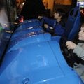 Sean Riedmueller, 4, right, and his brother, Ryan Riedmueller, 8, both of Perryville, play a video g...