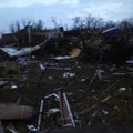 Wreckage from a destroyed barn covered an area near Cincinnati, Ark. Friday morning. The National We...