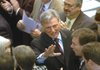  Gov. Mike Beebe greets legislators Tuesday after taking the oath of office in the House of Representatives at the state Capitol in Little Rock. 