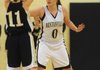 Bentonville Gold’s Alicia Lowrey, right, guards Bentonville Black’s Jordan Martin on Wednesday.