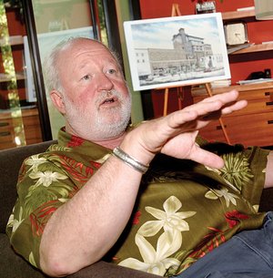 Richard Alexander talks about the Renaissance Tower Project at his Fayetteville office.