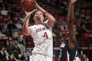 Arkansas center Sarah Watkins (4) and guard C’eira Ricketts are the only Razorbacks averaging more than nine points a game. 
