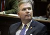  Rep. John Charles Edwards, D-Little Rock, watches a vote total in the House chamber Monday.