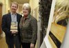 Scott and Carolyn Buss, directors of the Institute of Music, Worship and the Arts in Bella Vista, stand together Jan. 5 with a copy of their book, “Connect the Generations.”
