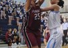 Springdale High’s Jasmine Gilyard shoots over Springdale Har-Ber’s Summer Morgan in the second half Tuesday in Springdale.
