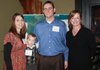 Director of the Northwest Arkansas office of the Arkansas Children’s Hospital Foundation Cindy Webb, from right, visits with Brad and Christy Norwood and their son Brycen Norwood at the Kampaign 4 Kids kick off on Tuesday.