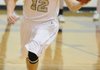 Bentonville’s Austin Heard, a sophomore, handles the ball during a recent game. Heard has been a fixture as point guard in the Tigers’ starting lineup.