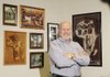 Harry Black, associational missionary with the Washington Madison Baptist Association, stands in his Fayetteville office Thursday. Black is leaving the position after 10 years to take a similar position in Oklahoma City.