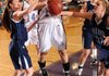 Fayetteville senior Emma Clay, center, has the ball stripped by Springdale Har-Ber senior Chani Wolf, left, and senior Maggie Gartner on Tuesday during the first half of the Lady Bulldogs’ 57-49 win at Fayetteville. Go to <a href="http://nwaonline.com/photoreprints">nwaonline.com/photoreprints</a> to see more photos.