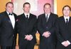 Bill Horton, from left, John Furner, Nick Tyler and James Di Salvo were among the candidates vying for the honor of kissing a pig during an American Diabetes Association fundraiser on Feb. 26. Di Salvo was one of the winners.
