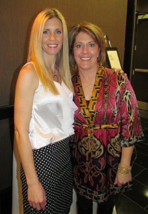 Northwest Arkansas Wine Opener co-chairwomen Ann Miller, left, and Michelle McFadden pose for a photo at the Feb. 25 event, which is a fundraiser for the Cystic Fibrosis Foundation.