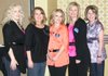 Leanne Williams, from left, joins fellow Junior Auxiliary members Jacque Adams, April Moler, Monica Fender and Shelly Parker at the “Are You Smarter than a Hog” fundraiser.
