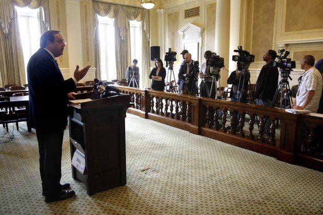 arkansas-family-council-president-jerry-cox-left-speaks-to-reporters-at-the-arkansas-state-capitol-in-little-rock-after-the-state-supreme-court-struck-down-an-arkansas-law-prohibiting-gay-couples-and-other-unmarried-people-who-live-together-from-adopting-or-serving-as-foster-parents