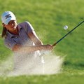 Stacy Lewis hits from a bunker on the 17th hole during the final round of the LPGA Kraft Nabisco Cha...