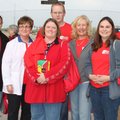 Northwest Health volunteers Keisha Newberry, from left, Becky Pratt, Pam Adams, Bryon Taylor, Pam Fr...
