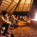 Holt Middle School student Maddie Douthit watches the campfire burn March 31 at the Ozark Natural Sc...