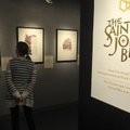 John Brown University students look April 1 over some of the framed pieces of The Saint John’s Bible...