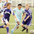 Springdale Har-Ber’s Miguel Gomez, center, pushes the ball past Fayetteville’s Anthony Euculano, lef...