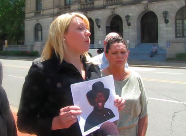 attorney-jessica-d-arbour-left-holds-up-a-photo-of-catholic-priest-charles-u-kanu-during-a-news-conference-wednesday-outside-the-pulaski-county-courthouse