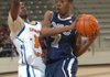Connecticut Basketball Club’s Kris Dunn (7) works against Dream Vision’s Shabazz Muhammad, who scored 20 points in a 71-59 victory at the Jack Stephens Center in Little Rock on Friday.

