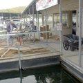 NEW JJ’S GRILL OPENING SOON Above, mallard ducks swim in Beaver Lake in front of the new JJ’s Grill ...