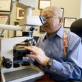 Dr. Anthony N. Hui, a pathologist at Northwest Arkansas Pathology Associates in Fayetteville, looks ...