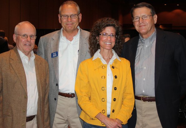 
                               
                                  Photo by Carin Schoppmeyer&mdash;
                               
                           
                           Ozark Natural Science Center board members David Swearingen, from left, Tony Bornhoft, Lisa Watkins and David Thrasher welcome supporters to Call of the Wild on April 16 at the John Q. Hammons Center in Rogers.