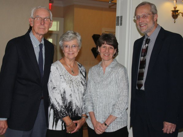 
                               
                                  Photo by Carin Schoppmeyer&mdash;
                               
                           
                           Elizabeth Richardson Center Executive Director John Buck, from right, the Rev. Jan Butin, Janet Baker and Wade Burnside stand for a photo Tuesday evening.
