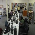 Patrons use computers and check out books Friday at the Lincoln Public Library. Mayor Rob Hulse said...