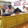 Curtis Evans, third from left, signs a national letter of intent Monday afternoon in Bulldog Gymnasi...