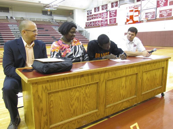 Curtis Evans, third from left, ...