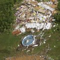 A building is seen destroyed in Vilonia, Ark., Tuesday, April 26, 2011, after a tornado struck the a...
