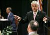 Congressman Steve Womack, representative of Arkansas's third congressional district, chats briefly with constituents Friday before a luncheon sponsored by the Bentonville/Bella Vista Chamber of Commerce at the DoubleTree Guest Suites hotel in Bentonville.