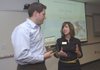 Mark Mast with General Mills accepts a recognition award from Kelly Kemp with The Jones Center at a Community Grants reception at the General Mills offices on April 21. The Jones Center was one of seven nonprofit organizations that received a Community Grant from the General Mills foundation.