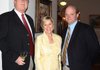 Jim Montgomery, from left, Sheree Alt and Will Herrin help support Habitat for Humanity.