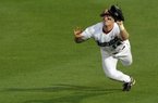 Arkansas Democrat-Gazette/MICHAEL WOODS - 05/05/2011 - Arkansas right fielder Jarrod McKinney makes a diving catch for an out during a 4-3 win over Florida at Baum Stadium in Fayetteville.