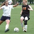 Shiloh Christian’s Lindsey Roe, left, and Malvern’s Emma Paul try to control the ball in their match...
