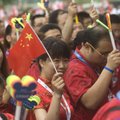 Walmart’s Chinese delegation enters Barnhill Arena on Wednesday for the 2011 International Conferenc...