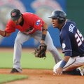 Northwest Arkansas’ Salvador Perez looks for the call from the umpire after Frisco’s Guilder Rodrigu...