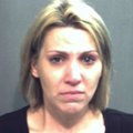 This image provided by the Orange County Jail shows the booking photo of the estranged daughter of a...