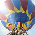 Haley Whitelaw, left, and Holly Anderson join a few Root Elementary School classmates for a hot air ...
