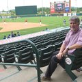 Documentary filmmmaker and journalism professor Larry Foley loves to be in his seat at Baum Stadium.