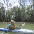 Warren Cunningham of Springdale admires the newly created swamp habitat of Beaver Lake’s War Eagle a...