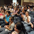 Students from Helen Tyson Middle School cheer Wednesday for their classmates while watching a slide ...