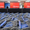 FILE - In this file photo take Dec. 15, 2010, shopping carts are shown inside a Wal-Mart store in Al...