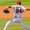 DAVE CRUZ/Special to the Arkansas Democrat-Gazette - 6/4/11 - DJ Baxendale delivers a pitch during A...