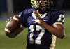 Pulaski Academy quarterback Fredi Knighten looks downfield for a receiver against Ozark during first quarter action at Rector Field in Little Rock, November 19, 2010.