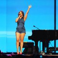 Alicia Keys performs during the Walmart shareholders meeting Friday at Bud Walton Arena.
