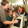 Teenagers, from left, Trevor Piearcy, Jacob Bilyeu, Gerald Hogue, Adam Parmer and Danielle Hogue lau...