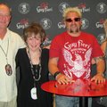 Celebrity chef Guy Fieri, second from right, is joined by Kent Starr, from left, Billie Starr and Sa...